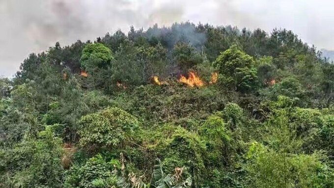 A hillside ablaze at the crash site of the China Eastern Airlines flight on March 21.