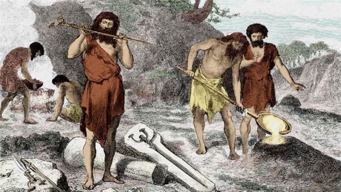 Ancient people melting copper ore to cast tools and weapons.