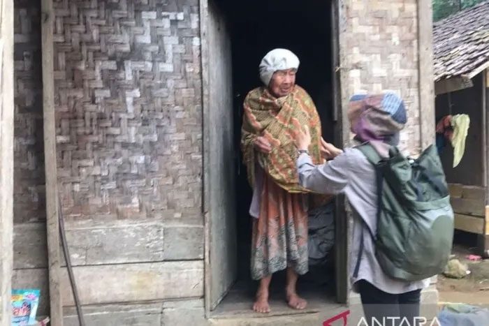 At 103 years old, Mrs. Sahria still gardens daily and washes clothes in the pond behind her house.