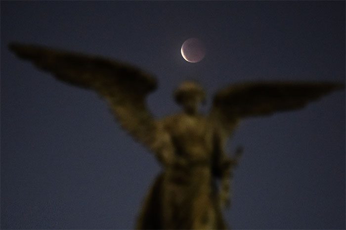 The Moon at 6:55 PM in a park in Binh Thanh district, Ho Chi Minh City.