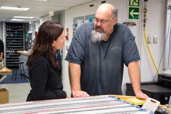 Two scientists participating in the research