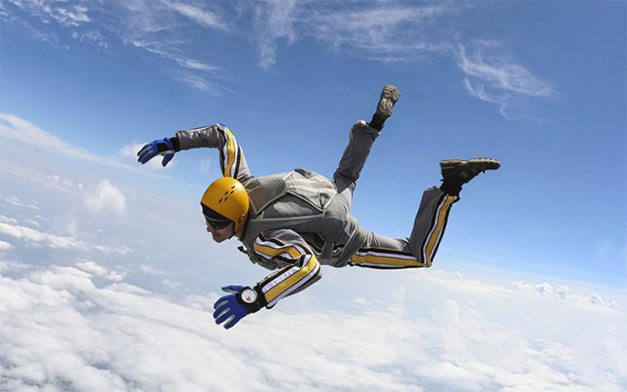 When skydiving and in free fall, a person can reach terminal velocity of about 200 km/h after 15 seconds.