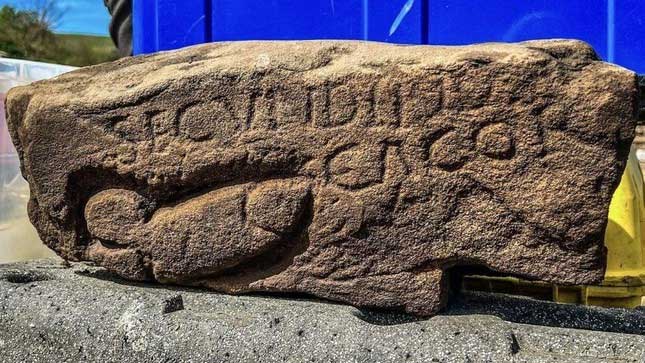 The stone with the carving of male genitalia and the Roman insult from 1,700 years ago.