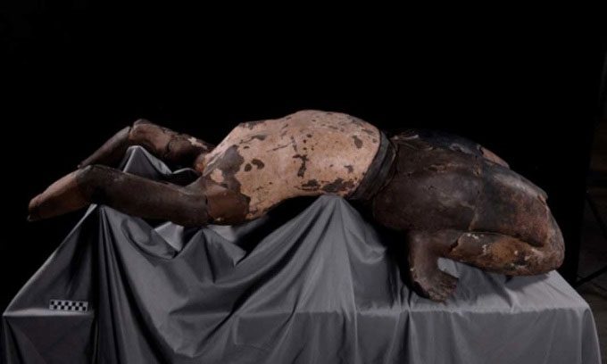 The statue simulating an acrobat in the tomb of Emperor Qin Shi Huang.