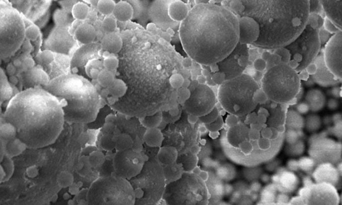 Tiny glass beads found in fly ash containing REE.