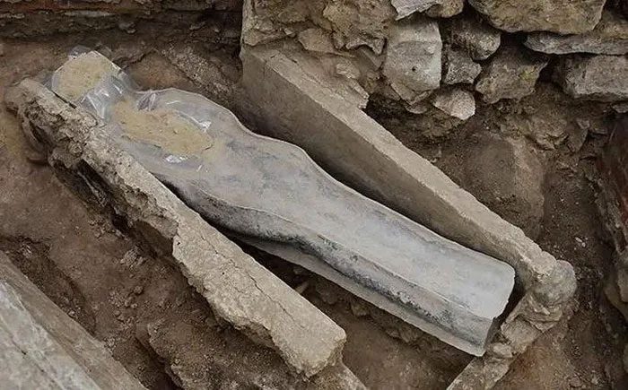 The recently excavated lead coffin