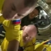 russian astronaut wears ukrainian colored outfit to iss 119482