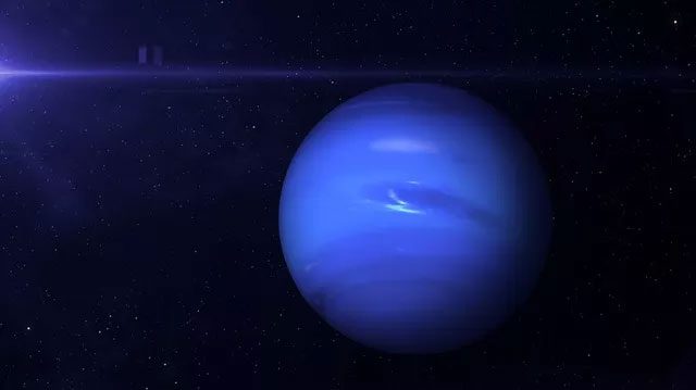 Neptune appears blue.