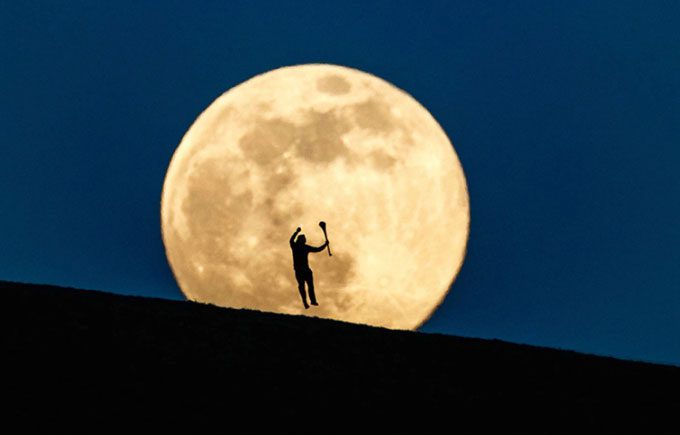 Supermoon shining brightly over Croghan Hill, Ireland in April 2020.