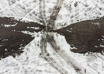 song on the alps in switzerland burns to show the paved road 123163