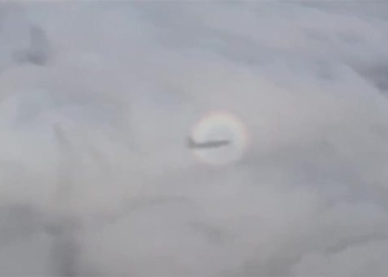 strange rainbow surrounding airplane and the unexpected reality 122866