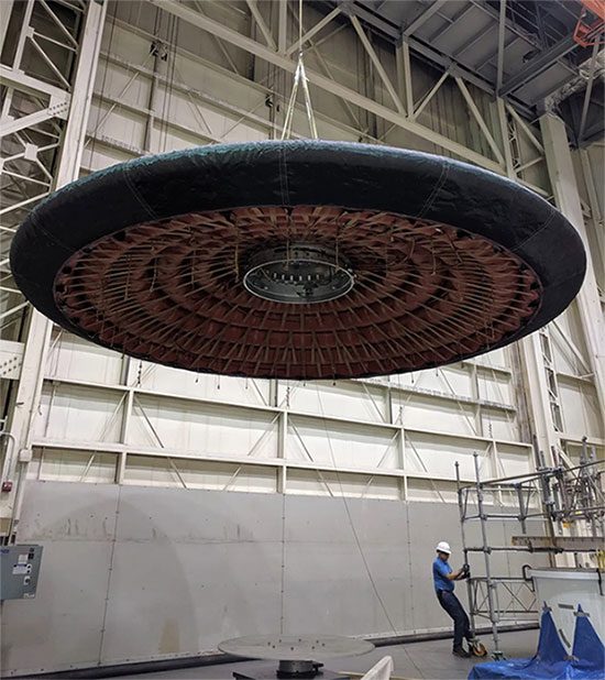 The LOFTID decelerator inflated and lifted onto a test stand at the research facility.