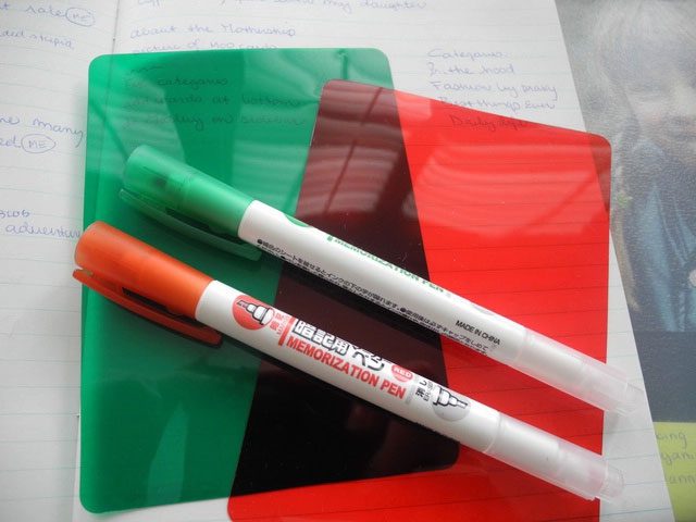 Green and red plastic sheets are essential for Japanese students during exam preparation.