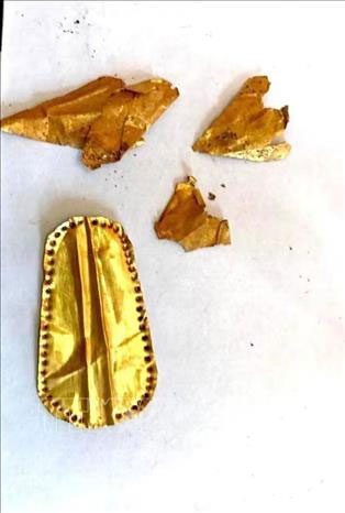 Some gold plates excavated at the Quweisna necropolis in Menoufiya province, Egypt.