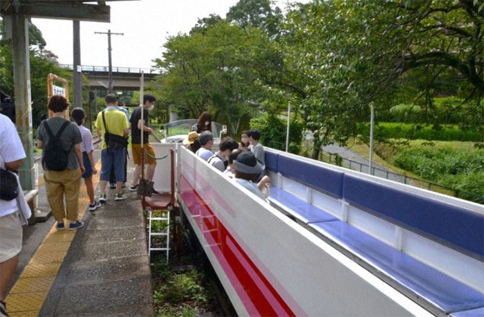 Tourists excited to try the unique fuel-powered train