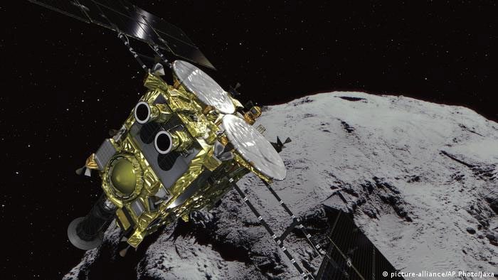 Japan's Hayabusa-2 spacecraft carrying a sample container from asteroid Ryugu