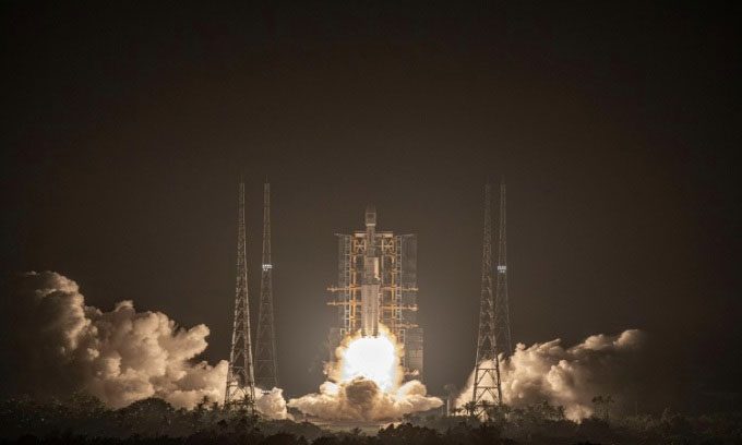 Long March 7A rocket launching from Wenchang launch site.