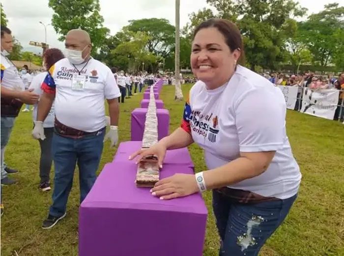 Thousands of chocolate bars lined up in a straight row with a total length of 854 meters