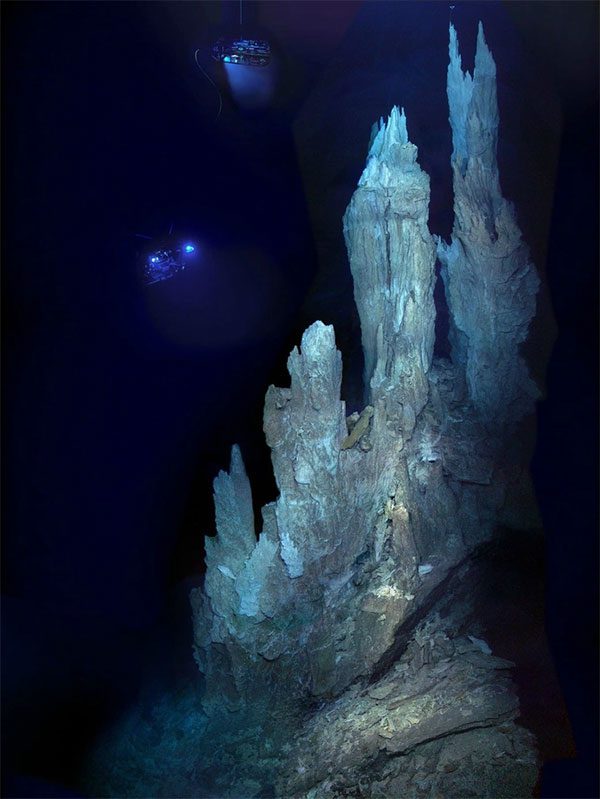 A remotely operated vehicle illuminating the towers of the lost city.
