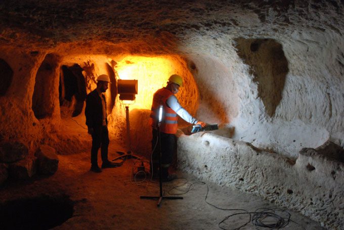 Experts working in the underground city in Midyat on April 18.