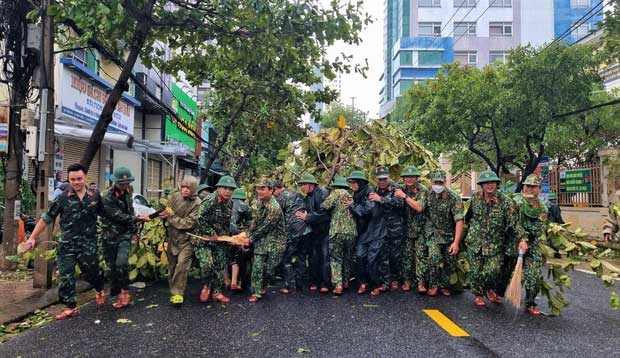 Authorities have taken to the streets to urgently clear fallen trees.