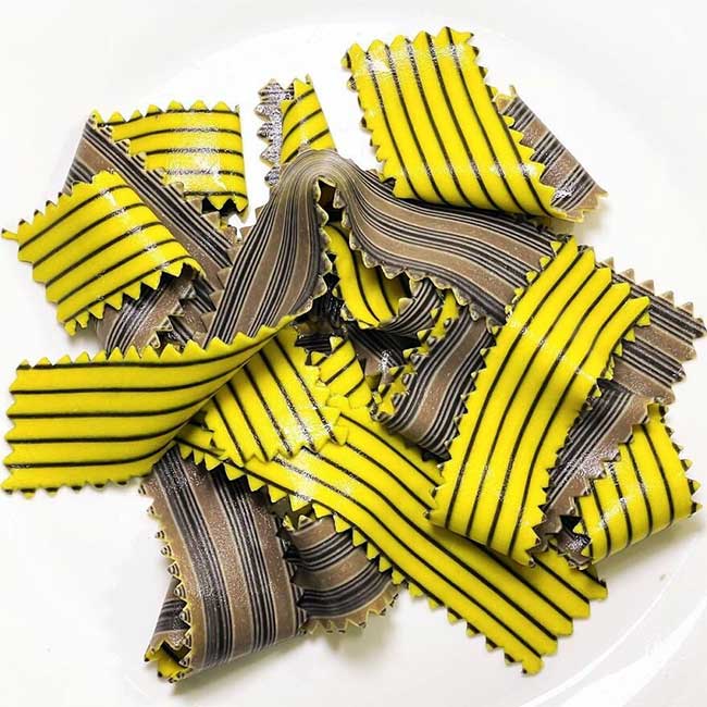 Noodles created in various colors and shapes.