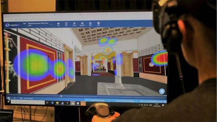Virtual reality users touring the ancient house.