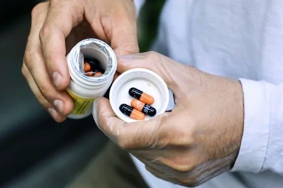 Black and orange pills are the "lifeline" for monkeypox patients