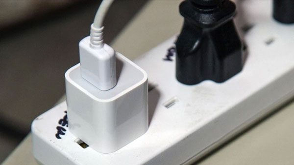 Users can purchase power strips for convenience when unplugging devices. Photo: Shutterstock.