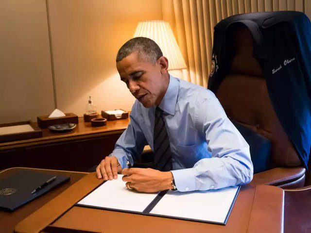 U.S. President Barack Obama writing left-handed