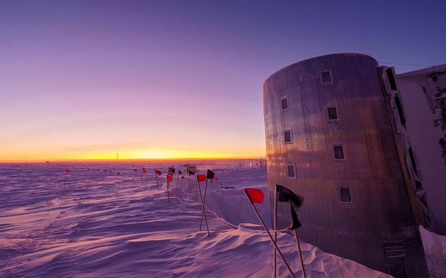 The sun rises over the NOAA station in Antarctica, where the ozone hole opens annually.