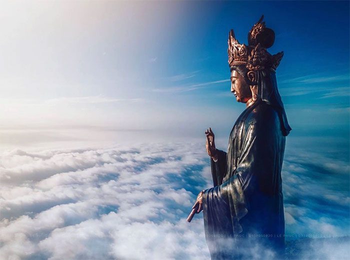 The location of the tallest bronze statue of Avalokiteshvara in Asia located on the mountain peak.