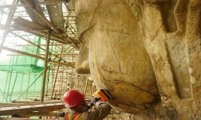 Colossal statue of the Buddha in the Longmen Grottoes.