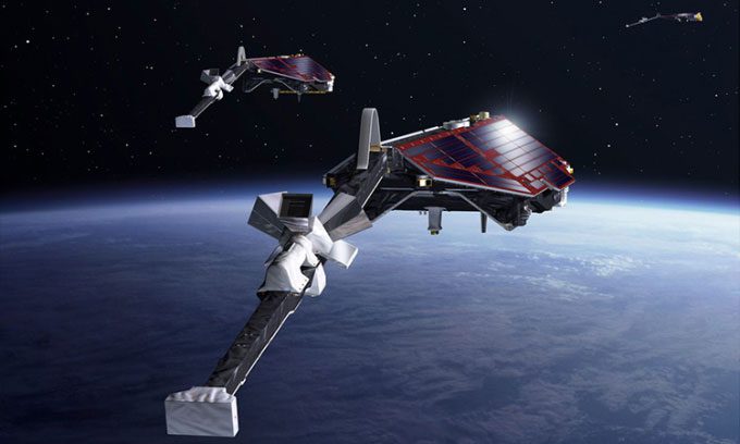 Illustration of Swarm satellites in space.