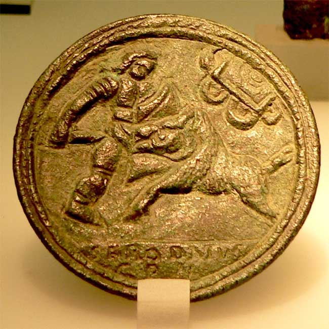 Medallion depicting a hunter facing wild beasts in the arena