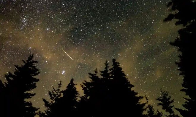 Meteor streak in the sky during the annual Perseid meteor shower in August 2021