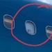 warning phone trend at airplane window to record clip 121667
