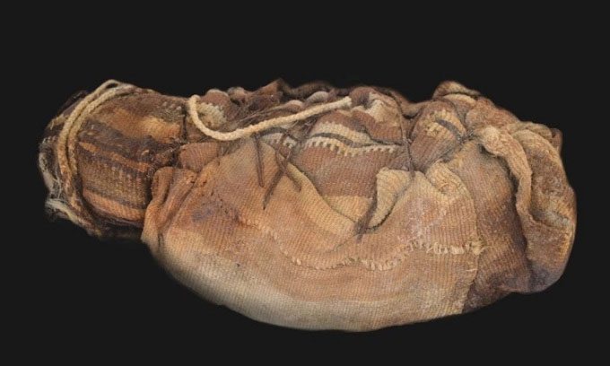 The mummy of a child who consumed coca leaves.