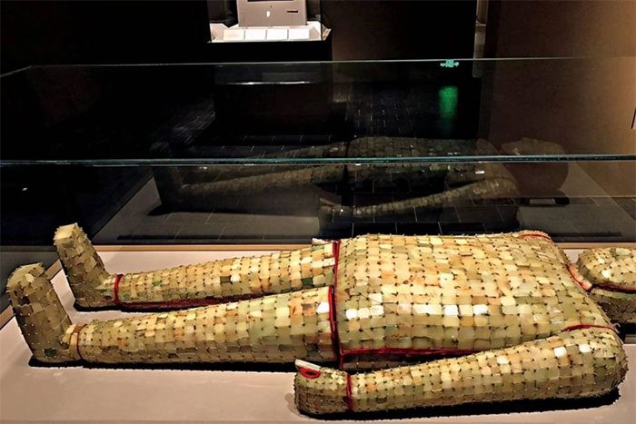Jade garments typically only had the gold threads taken.