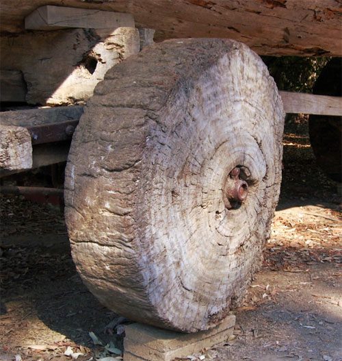 An early wheel made from a solid piece of wood.