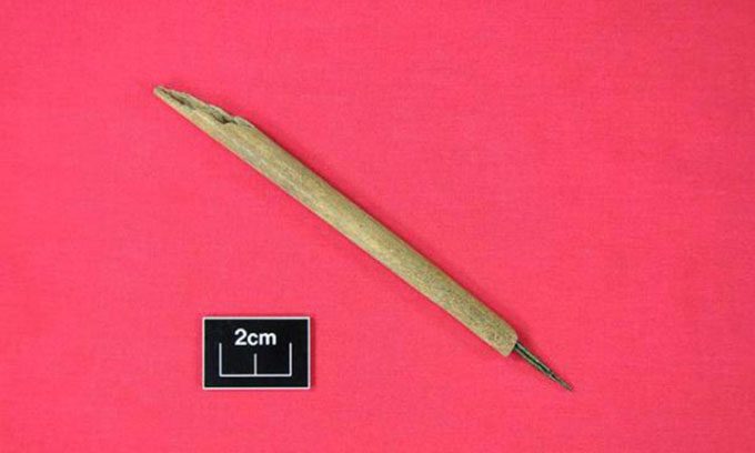 Ancient ink pen made of hollow bone and a bronze alloy nib.