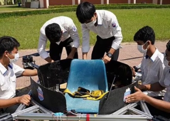 cambodian students in bien hoa quietly sit in class with convenient aircraft 116097