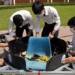 cambodian students in bien hoa quietly sit in class with convenient aircraft 116097