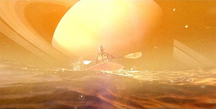 A still from the video, showing a scene of people kayaking on Saturn's moon Titan.