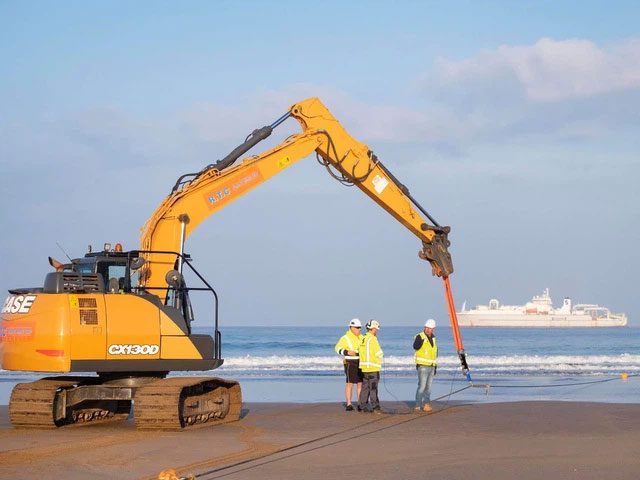 Finally, the cable is pulled onto the beach to a pre-made trench