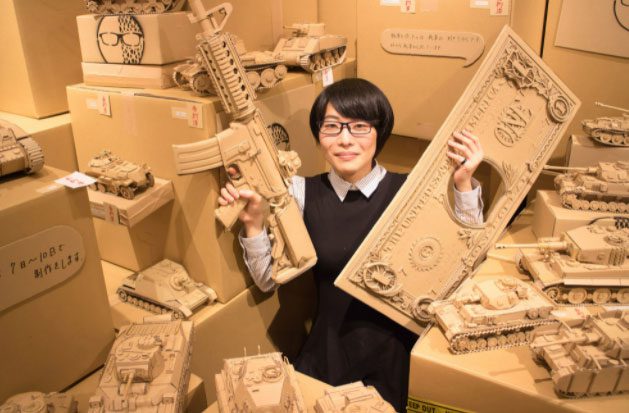 Monami Ohno and her cardboard art pieces.
