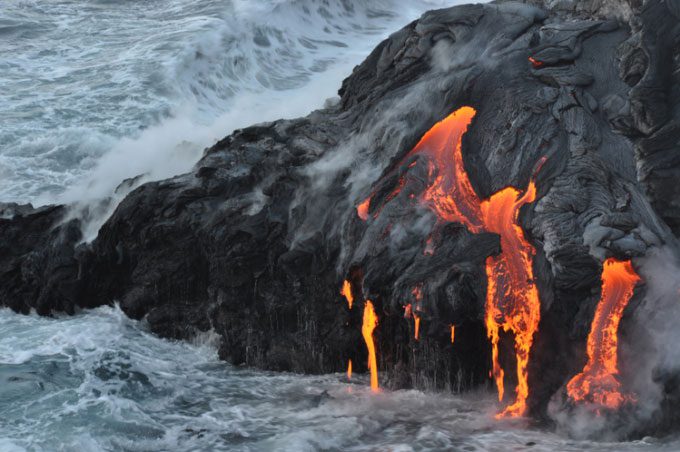 Lava flowing into the Pacific Ocean at Kupapa‘u Point, Kilauea, Hawaii.