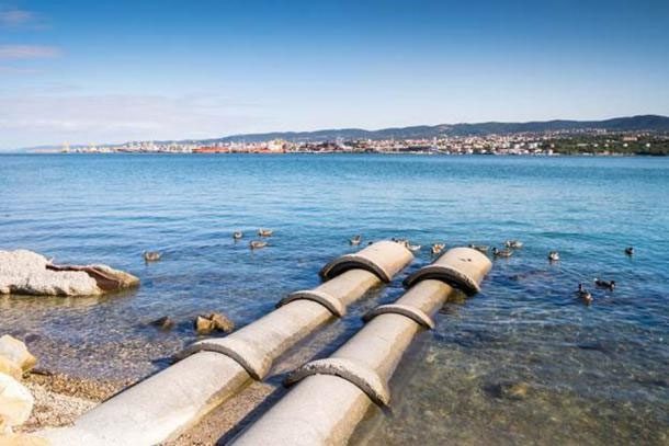 Many structures need to be built underwater, concrete pipes going out to sea
