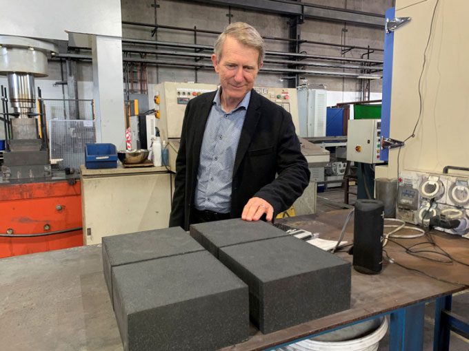 Erich Kisi examines thermal energy bricks in Newcastle, Australia, October 2021.