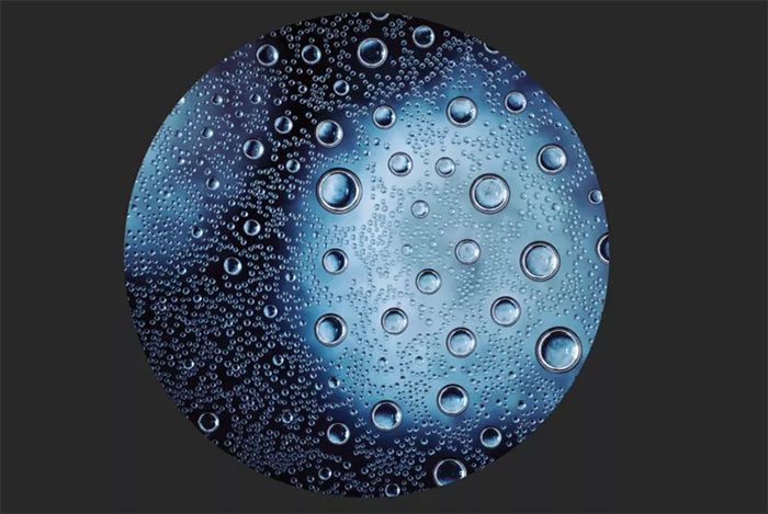 Super tiny water droplet beginning to freeze.